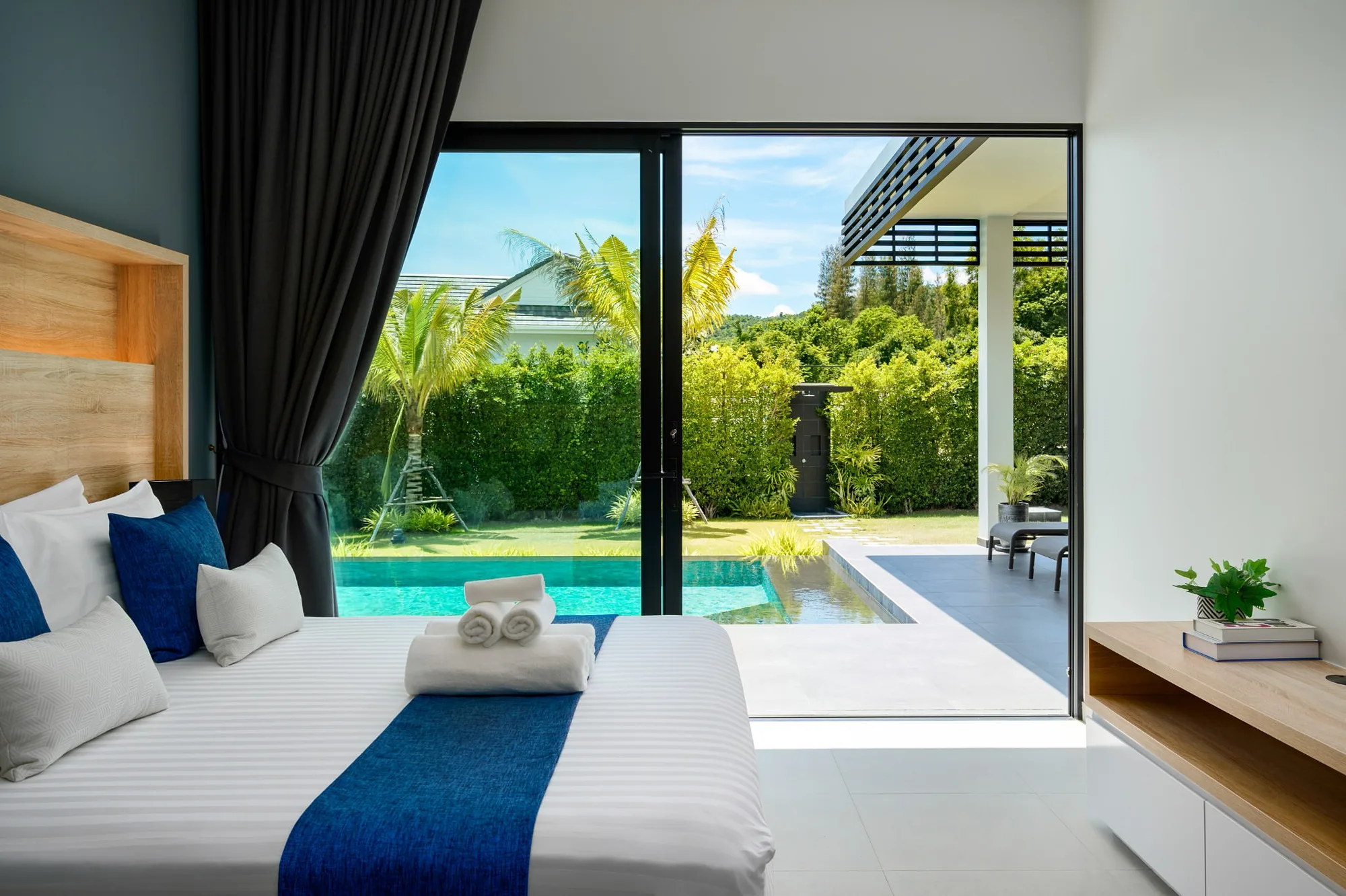 Bedroom opening to the pool