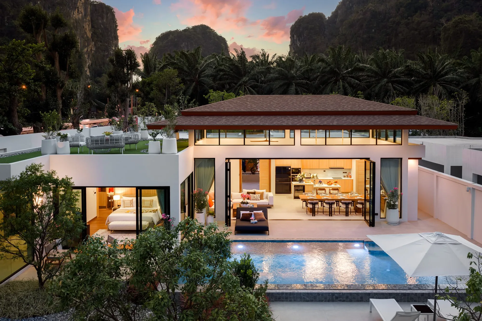 Villa at sunset below the cliffs