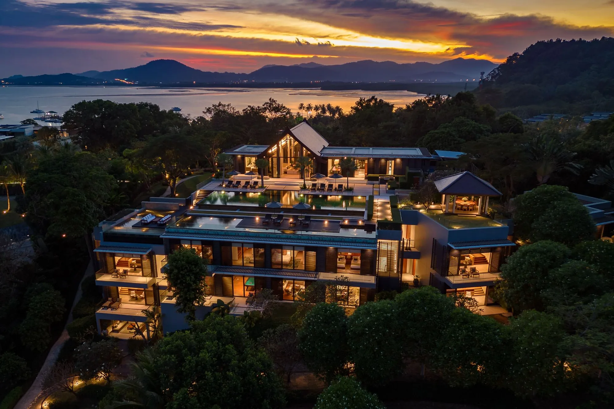 Beachfront estate from the air at twilight, Natai, Phang Nga