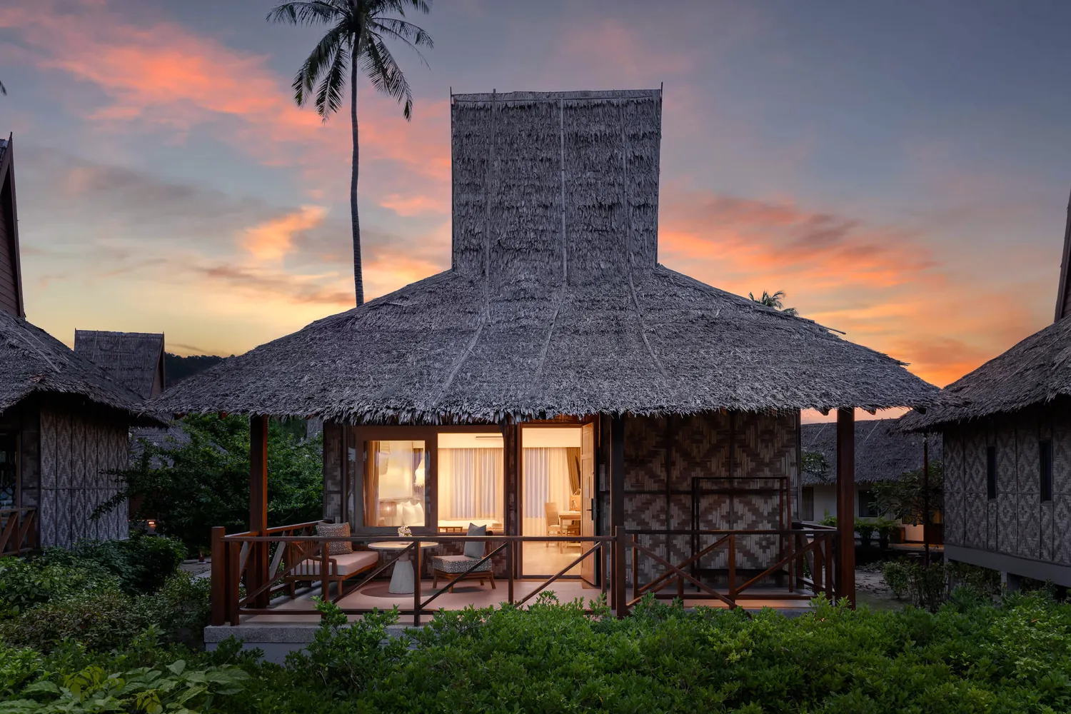 Saii Phi Phi Island Village bungalow at sunset