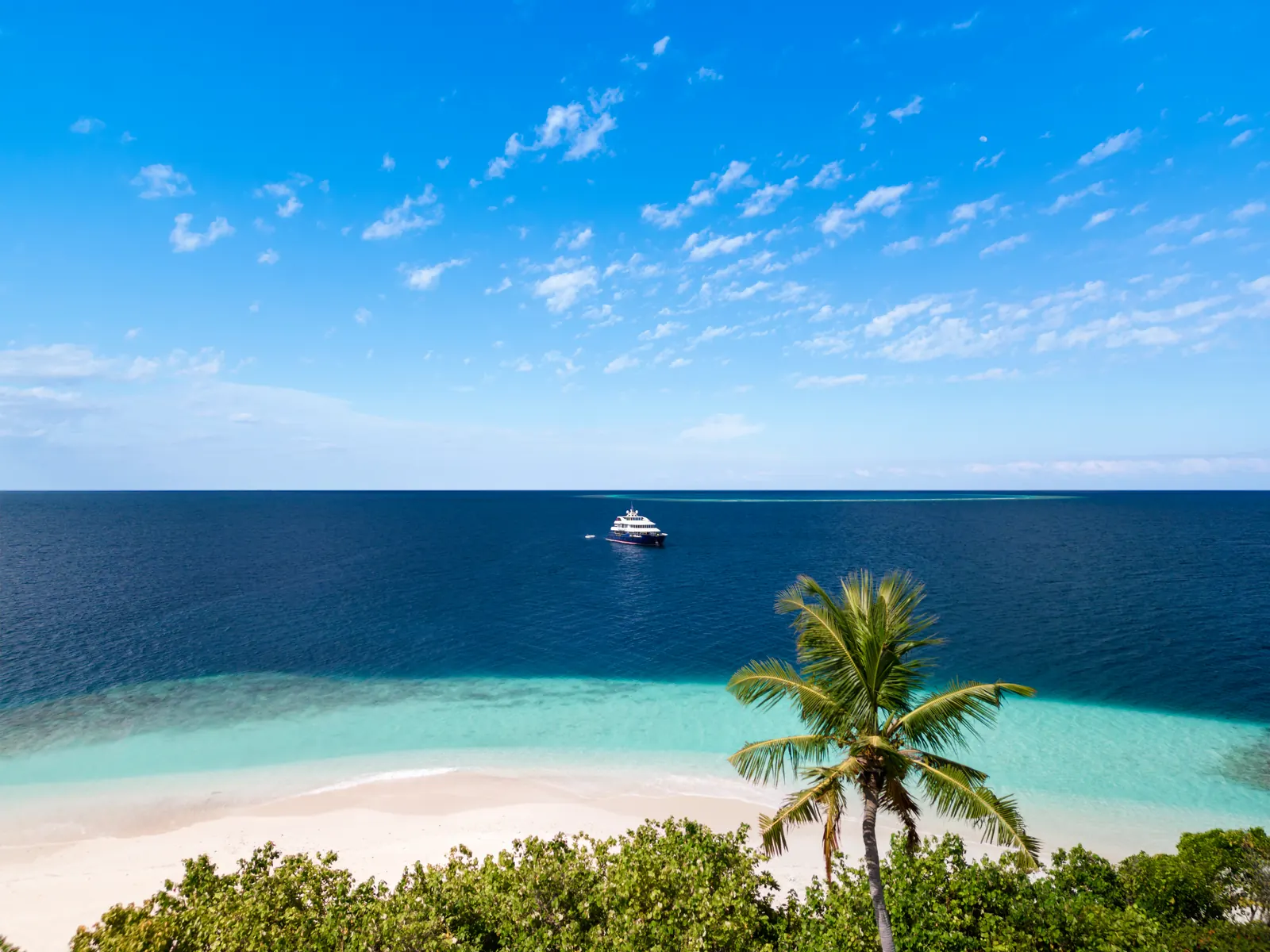 Seafari superyacht, aerial view over reef, Maldives