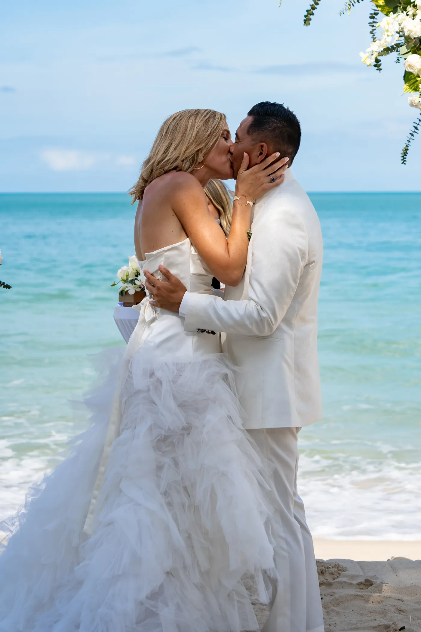 Bride and groom's first kiss, beach wedding, Koh Samui