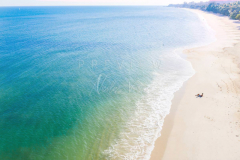 Man relaxing in empty beach in Lamai