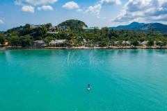 Aerial view stand up paddle board in maenam beach