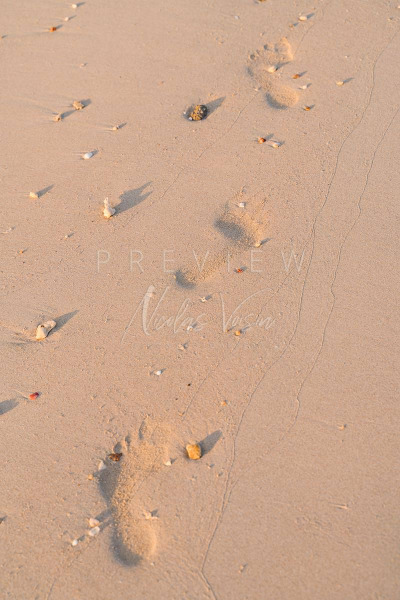 Foot step on the beach