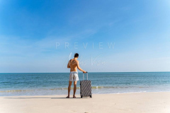 Traveler in empty beach