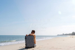 Traveler in empty beach