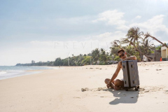 Traveler in empty beach