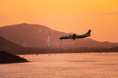 Bangkok airways plane in Samui sunset sky