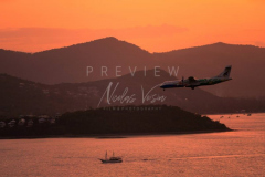 Bangkok airways plane in Samui sunset sky