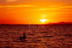 fisherman boat silhouette at sunset