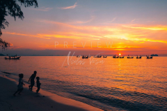Kids playing at Nathon beach at sunset
