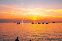 Kids playing at Nathon beach at sunset