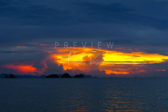 Sunset behind the 5 islands silhouette